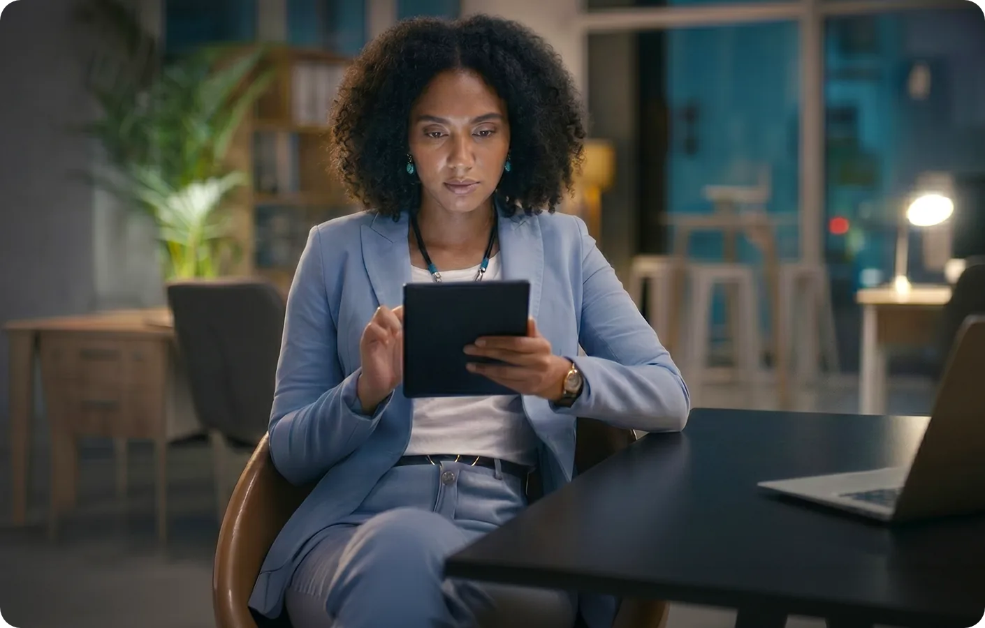 Reviewer using a tablet during a video review session